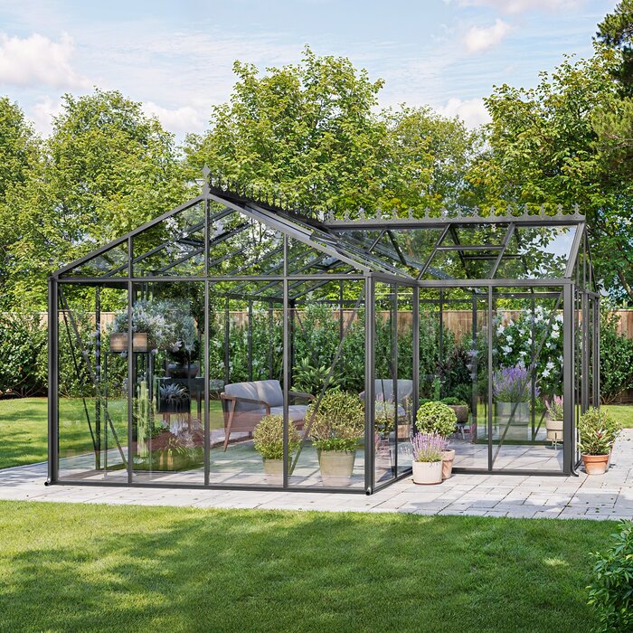 T-formet orangeri i aluminium som forbindelse mellem terrasse og have