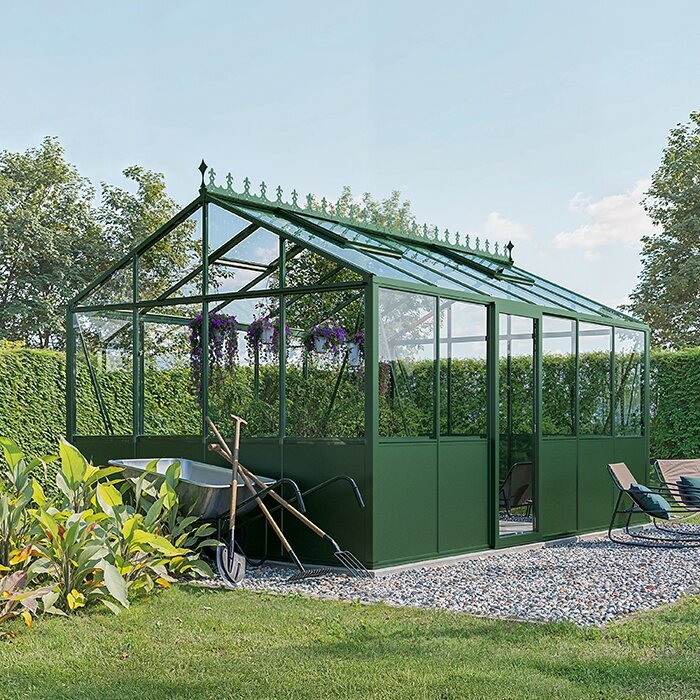 Lux Prestige aluminiumdrivhus som forbindelse mellem terrasse og have
